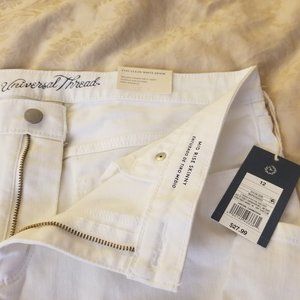 NWT white Mid-rise skinny jeans